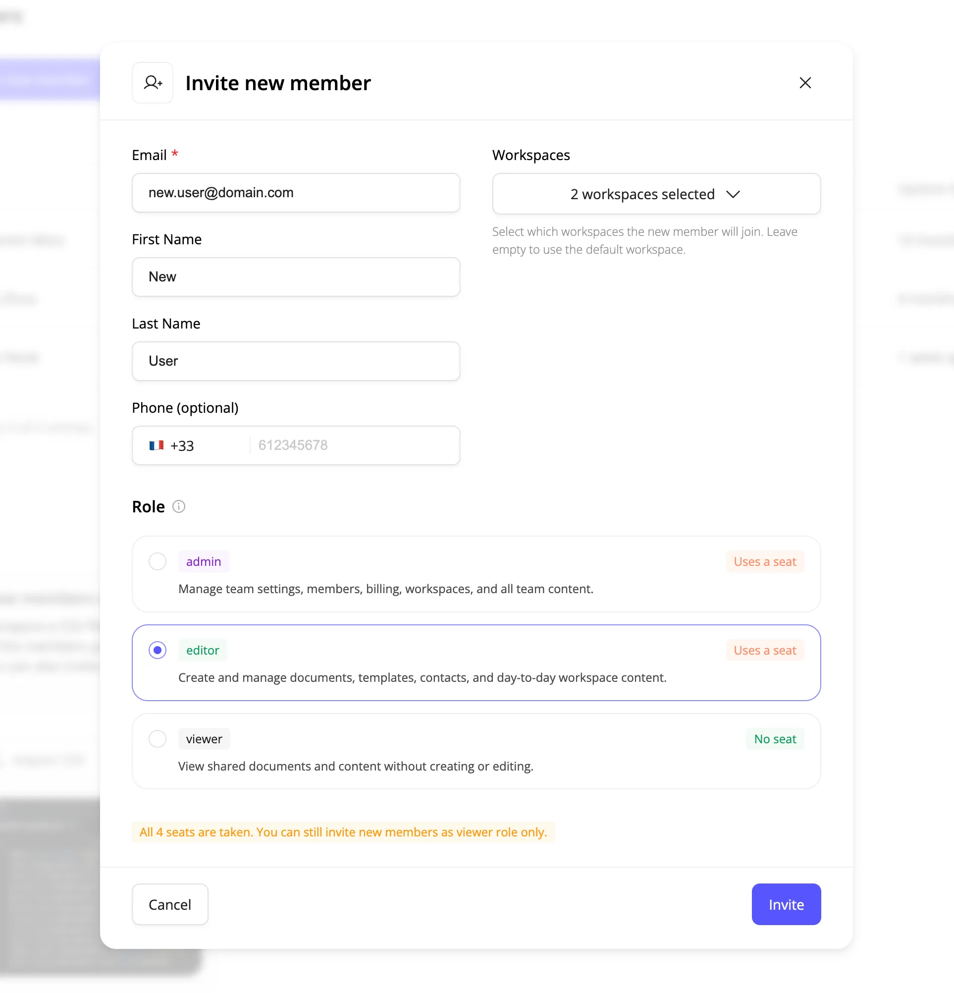 Invite new member modal with email, role, and a workspaces selector